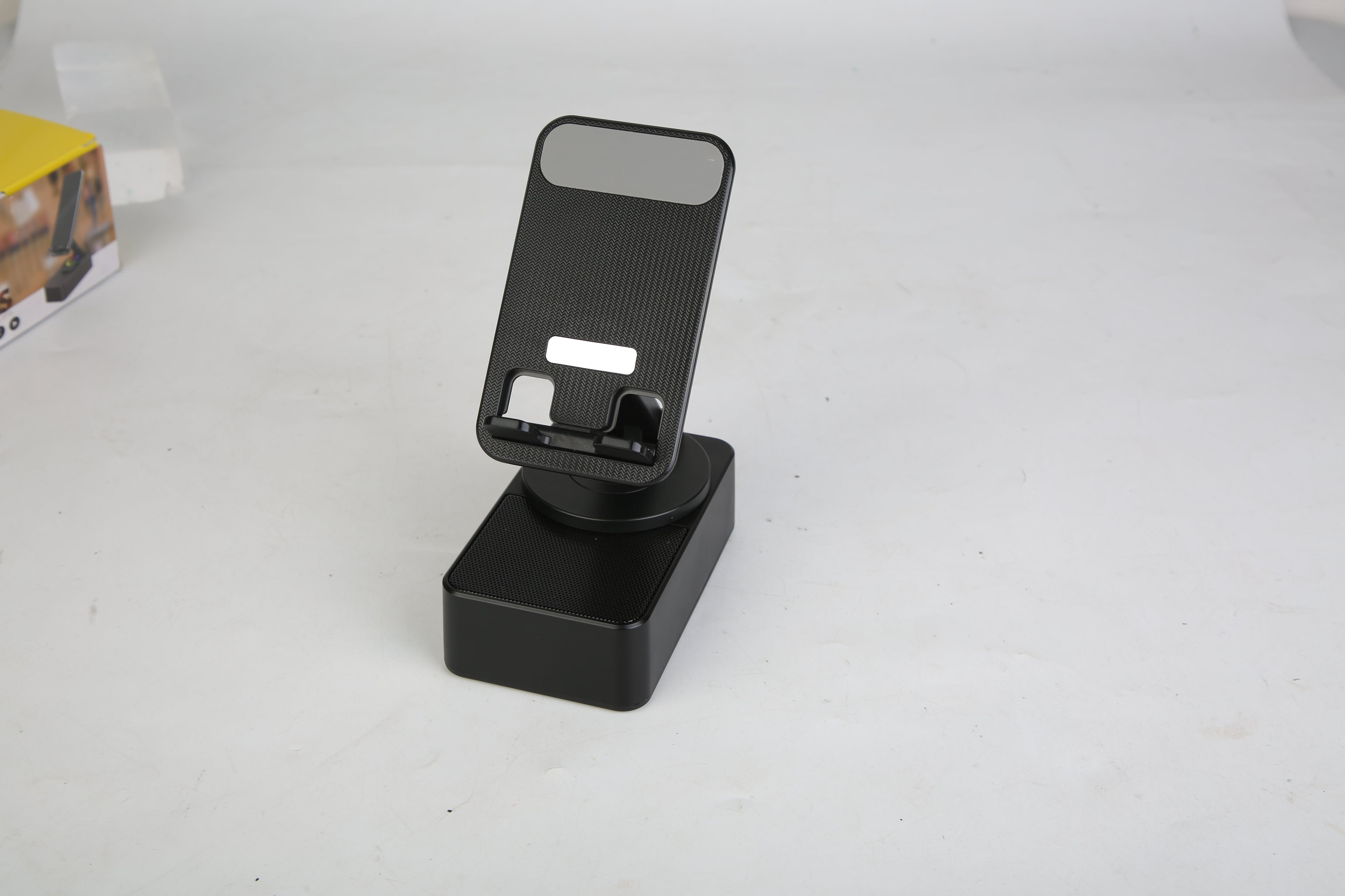 4-in-1 Multimedia Station: Foldable 360° Rotating Phone Stand with Integrated Bluetooth Speaker and 5000mAh Power Bank